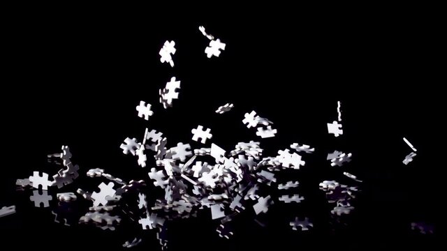 Pieces of Jigsaw Puzzle falling. Finding a Solution for Business problem.