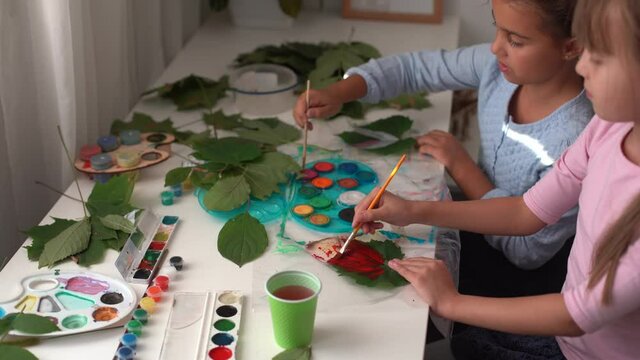 autumn craft for kids. animal Fox made from maple leaf. childrens art and creative. handicraft made from natural materials. girls draws with paints.