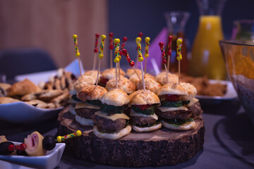 small burgers on the table