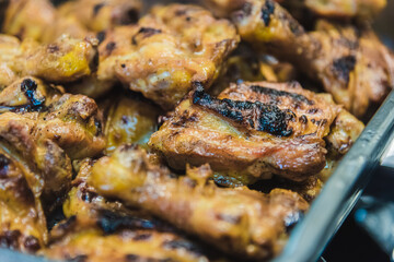 Roasted chicken on the barbecue grill.
