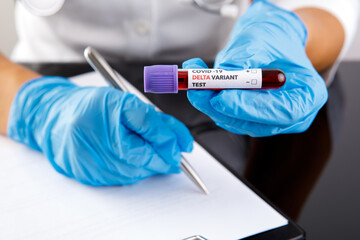 covid 19 delta Variant vaccine and test blood in hand on white background. vaccination against...