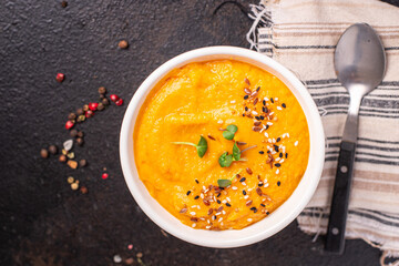 pumpkin cream soup puree fresh portion meal snack on the table copy space food background rustic veggie vegan or vegetarian food