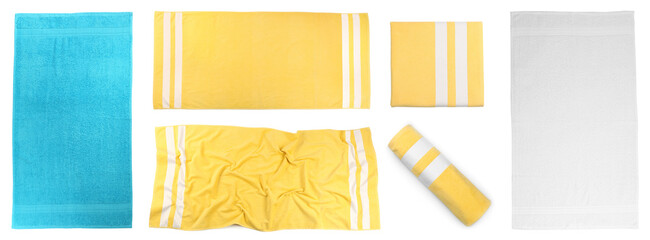 Set with different beach towels on white background, top view. Banner design