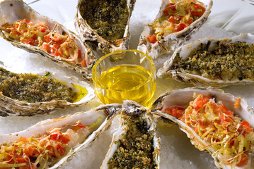Aromatic assorted oysters, with leeks, tomato, parmesan and butter and with chopped onion