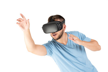 Young man playing with a VR glasses on a white background