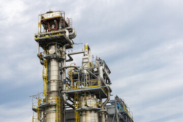 View of the absorption distillation column of gas liquefaction in summer.