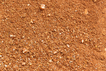 Ground surface texture, red soil background
