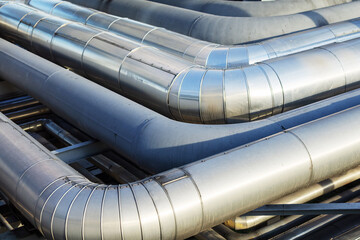 Abstract view of a set of pipelines running through a liquefied gas production plant.