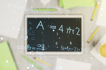 Creative scientific formula hologram and modern digital tablet on background, research concept....