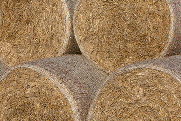 Straw rolls, stacked in a pyramid. Close-up shot.