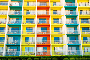 Architectural image of colorful building with balconies and windows