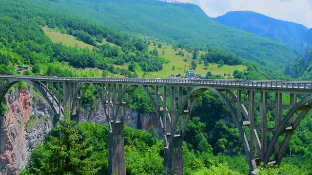  Durdevica Tara Bridge, also known as the bridge of anti fascist, hero lieutenant Bozhidar Zugic, is a concrete arch bridge over the Tara Canyon River in northern Montenegro.