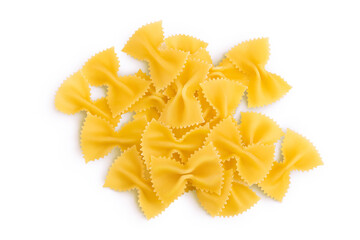 Bow tie pasta isolated on white background with clipping path and full depth of field. Top view. Flat lay.