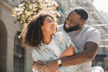 Trust love and bonding concept.Young african man hugging embracing his lover female woman while...