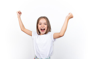 Child joy of success. Cute energetic little girl raising her arms excitedly. enjoy the victory,...