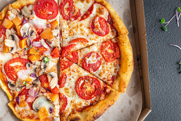 pizza mix different types of pizza in one box fresh portion ready to eat meal snack on the table copy space food background rustic. top view