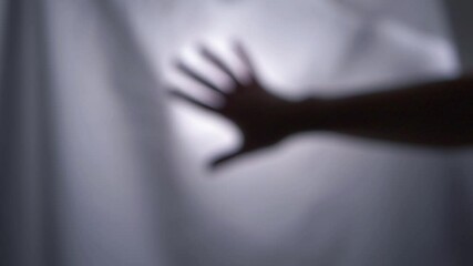 Ghostly hand on white shadow background