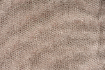 Fototapeta na wymiar Beige fabric texture close up for background