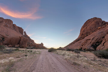 Pink cloud and blue sky before sunrise at Spitzkoppe