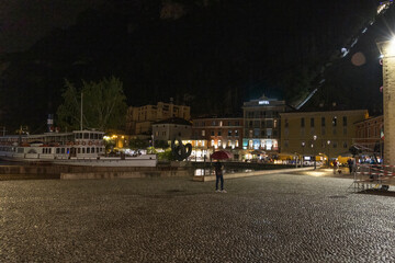 Obraz premium Night Harbour scene in Riva del Garda after thundershower