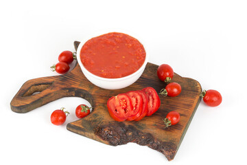 .handmade tomato sauce in white plate on white background