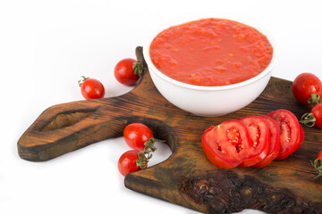 .handmade tomato sauce in white plate on white background