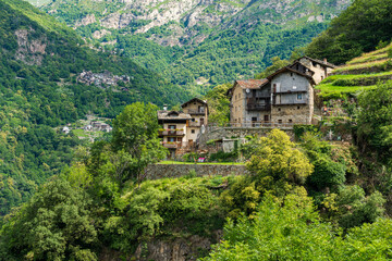 Fototapeta na wymiar Idyllic view at the small village of Rechantez, in the Lys Valley. Aosta Valley, northern Italy.