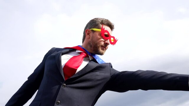 achievement and ambition of leader in hero mask, businessman