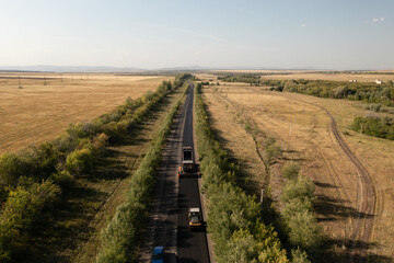 Aerial view of road constuction site among fields