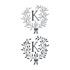 Vector Hand Drawn floral K monogram. Graphic elegant logo with letter K. - 456808404