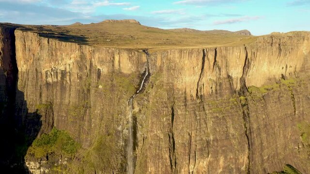 High cliff with Tugela falls in morning. Scenic Drakensberg mountains in South Africa