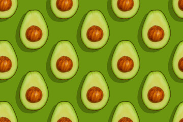 Avocado pattern on green background