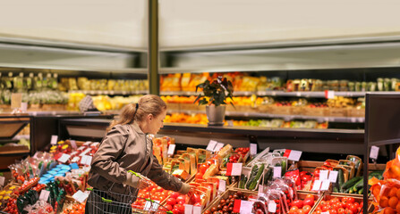 Woman buying vegetables at the market