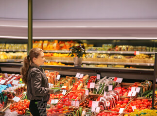 Woman buying vegetables at the market