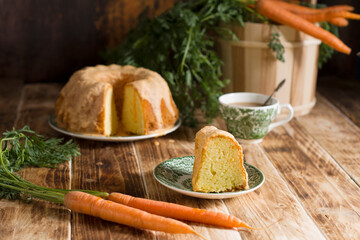 Sugar glazed carrot cake, homemade baked goods, rustic still life, national carrot cake day, cup of...