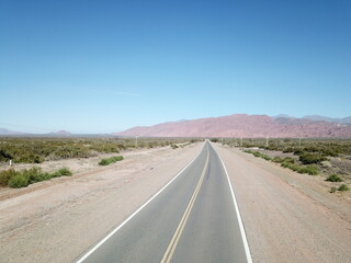Desert road on desert landscape