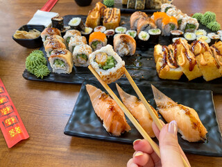 Sushi and chopsticks. Various sushis