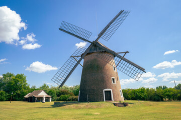 Fototapeta na wymiar Traditional hungarian windmill on a sunny summer day