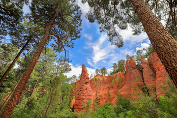 Red ochre rocks in the hilltop village of Roussillon, Luberon, Provence, France