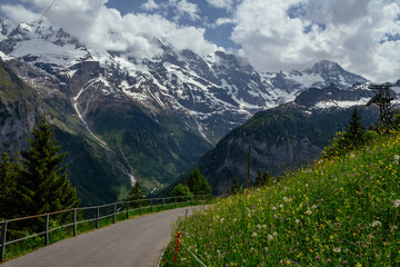 Alps in summer morning. Gimmelwald, Lauterbrunnen, Murren Switzerland, Alps mountain landscape with...