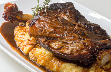 Lamb with polenta, a typical dish from the midwest of Santa Catarina. Italian and mountain cuisine
