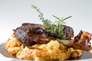 Lamb with polenta, a typical dish from the midwest of Santa Catarina. Italian and mountain cuisine