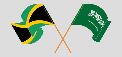 Crossed and waving flags of Jamaica and the Kingdom of Saudi Arabia