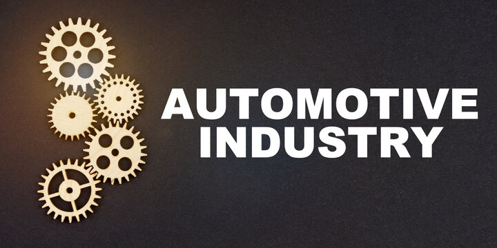 On a black background, gears and the inscription -