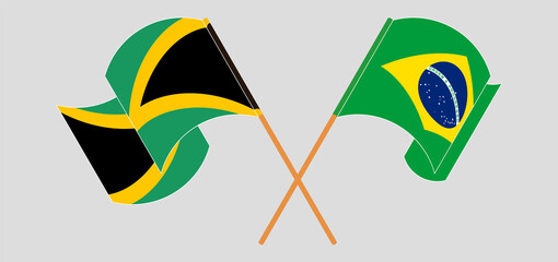 Crossed and waving flags of Jamaica and Brazil