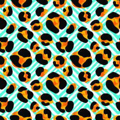 Seamless abstract wild exotic animal print.Leopard, zebra,gepard, tiger striped pattern. Hand drawn trendy repeating watercolor blotted background texture.  © OlgaLIS