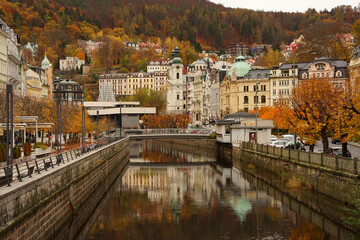 Naklejka premium Historic spa town Karlovy Vary, famous for geothermal hot springs used for treatment and Vridlo geyser