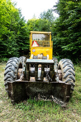 Forest tractor for logging after sawing trees, heavy forestry equipment