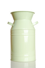 Metal vase painted with light pistachio, mint color paint, isolated on a white background