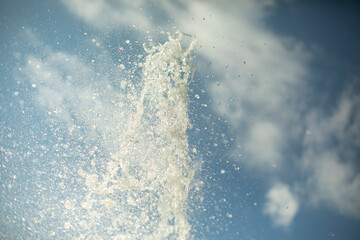 The fountain jet against the background of the sky.